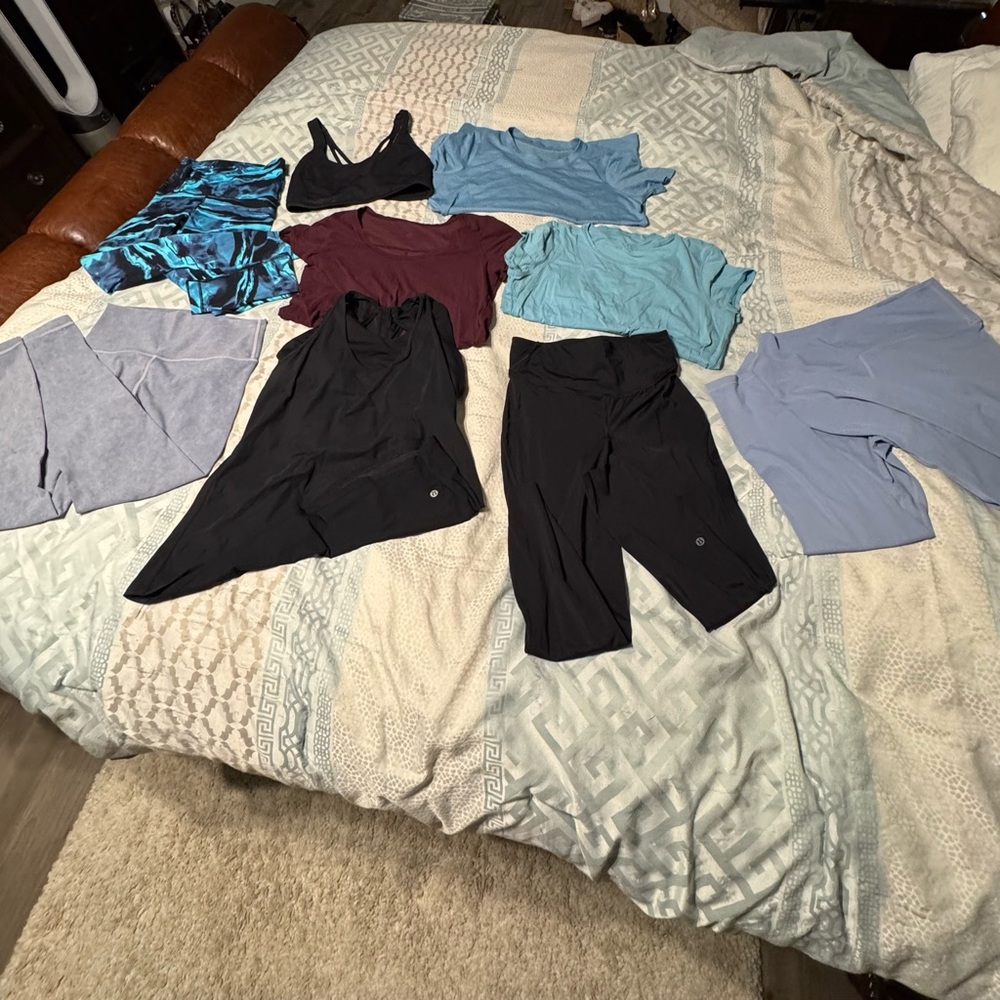 Lululemon lot of 9 leggings and sort sleeve tank w bars and Assorted Activewear